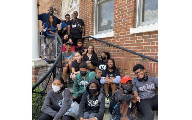 Brian Taylor and his CAPS scholars on the steps of the Princeton Entreprenerurial Hub