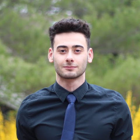 Ahmad Higazy standing in peaceful outdoor setting