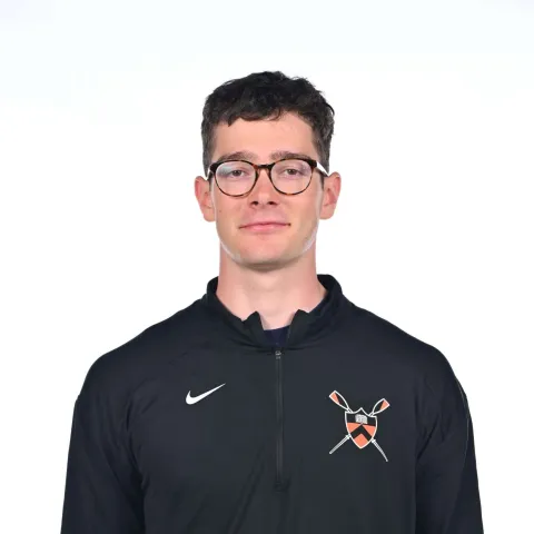 Smiling student in rowing jersey