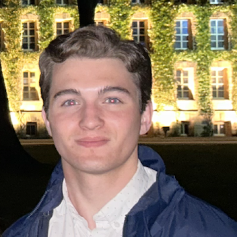 Student smiling on campus